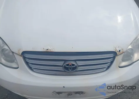 2003 Toyota Corolla Le z USA, uszkodzony, nr VIN JTDBR32E730043196